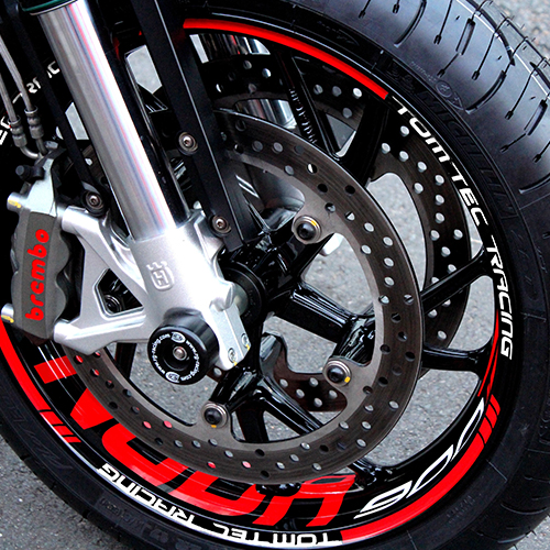 Close up of red rim sticker for motorcycle