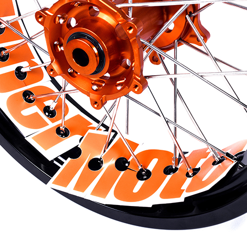 Close up of motorcycle tire with applied stickers